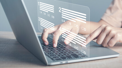Virtual test or questionnaire show on screen and answer check mark to measure grades. Education...
