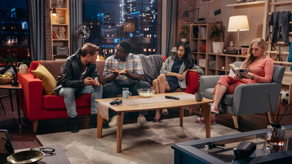 Television Sitcom Concept. Four Diverse Friends having Fun in the Living Room. TV Show Funny Sketch about Explaining Simple Thing. Comedy Series Screengrab on Network Channel or Streaming Service.