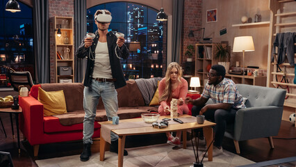 Television Sitcom Concept: Four Friends have Fun in Living Room. Funny Sketch About Two Couples. Guy in VR Headset has Metaverse Addiction. Comedy Series Broadcast on Local Channel, Streaming Service.