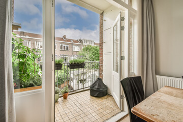 Views of various houses from the metal balcony