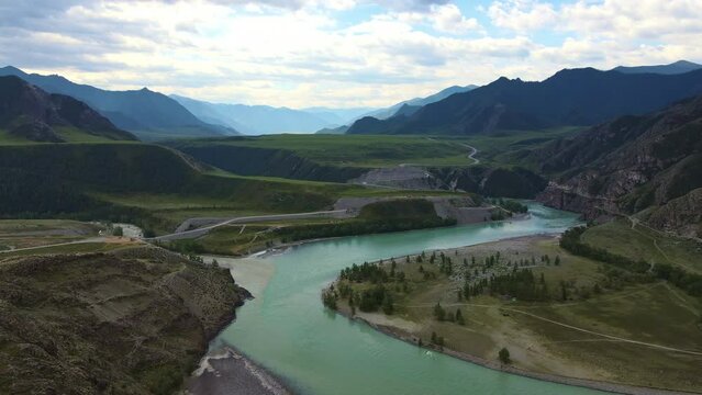 Aerial: Mountain valley. The confluence of the Chuya River and Katun