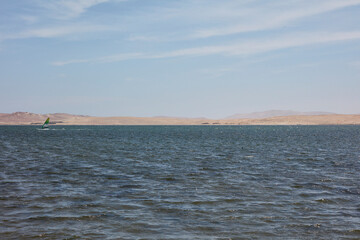Paracas is a city on the west coast of Peru. It is known for its beaches, such as El Chaco, located in the sheltered bay of Paracas. The city is a jumping-off point to the uninhabited Ballestas Island