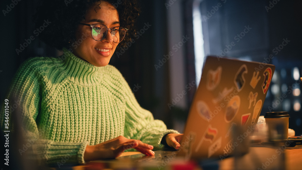 Poster positive black female software engineer coding on laptop computer, working with inspiration in her s
