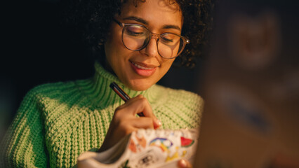 Portrait of Multiracial Teenage Designer Creating New Sneakers in the Evening. Female Artist is...