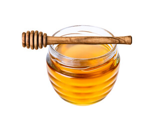 Honey isolated on white or transparent background. Jar with honey and honey dipper.
