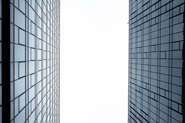 Modern business skyscrapers with reflection and symmetry