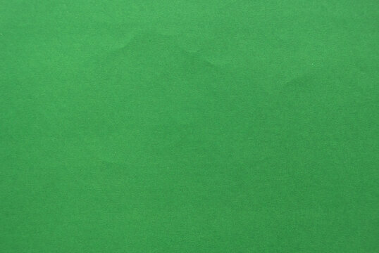 Green paper texture for background.