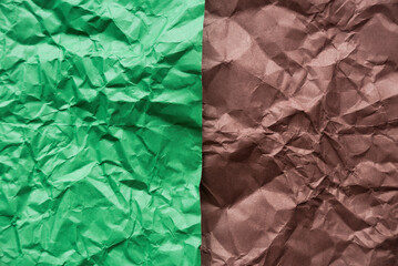 Green and brown crumpled paper for background.