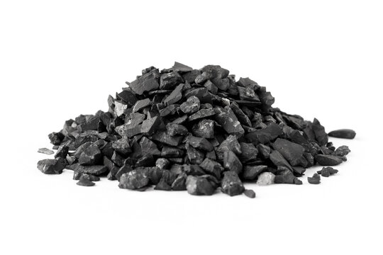 A pile of shungite on a white background. natural mineral. Close-up