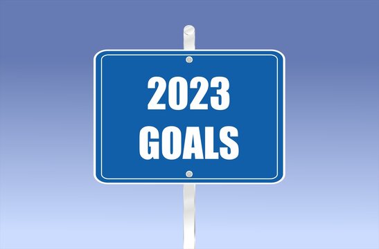 road sign with 2023 goals written on it