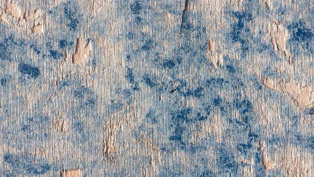 Tabl&oacute;n de madera pintado de azul desgastado 