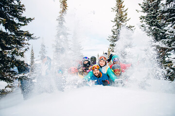 Group of snowboarders and skiers rejoice at snow. Concept life style, winter travel sport
