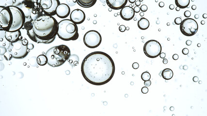 Moving Bubbles on Light Background, macro shot.