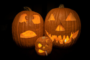 Trio of jack o latern pumpkins