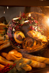 Obraz na płótnie Canvas Christmas bakery showcase with pastry and christmas decoration