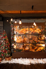 Christmas bakery showcase with pastry and christmas decoration