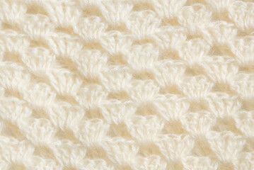 White knitted texture of woolen wool	
