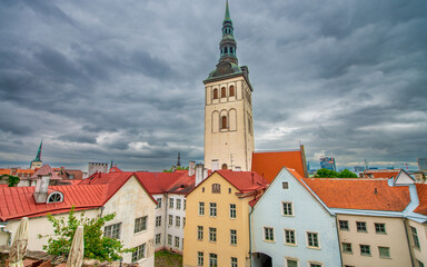 Obraz premium St Nicholas Church and colorful buildings in Tallinn Old Town, Estonia.