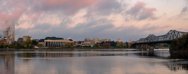 Fototapeta na wymiar View of the across the Ottawa River towards the Canadian Museum of History in Gatineau at sunrise.