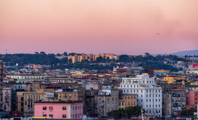 Residential Apartment Home Buildings in Historic Downtown City on Mediterranean Coast of Naples, Italy. Sunset Sky.