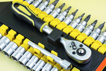 Construction ratchet with many attachments