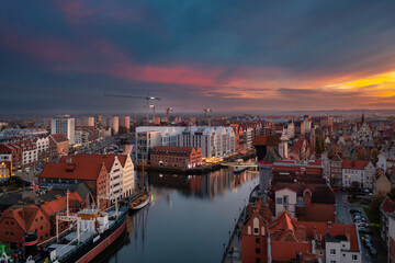 Fototapeta na wymiar Beautiful Gdansk city over the Motlawa river at sunset. Poland