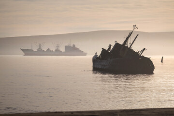 Abandoned ships on the beach of Severo-Kurilsk. Russia
