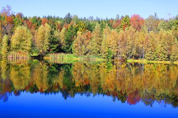 Fall landscape reflection Bromont Eastern Township Quebec province Canada