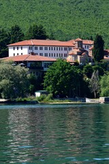 Fototapeta na wymiar old monastery on the shore of the lake