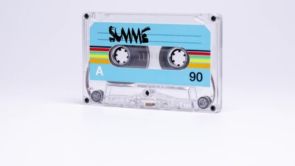 Cassette tape with summer mix words - Powered by Adobe