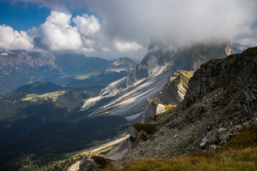 Clouds over mountain massif Odle in Dolomites