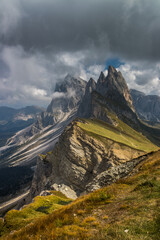 Clouds over mountain massif Odle in Dolomites