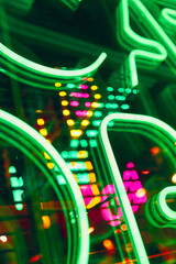 Neon abstract background. Glowing sign on the window in the city