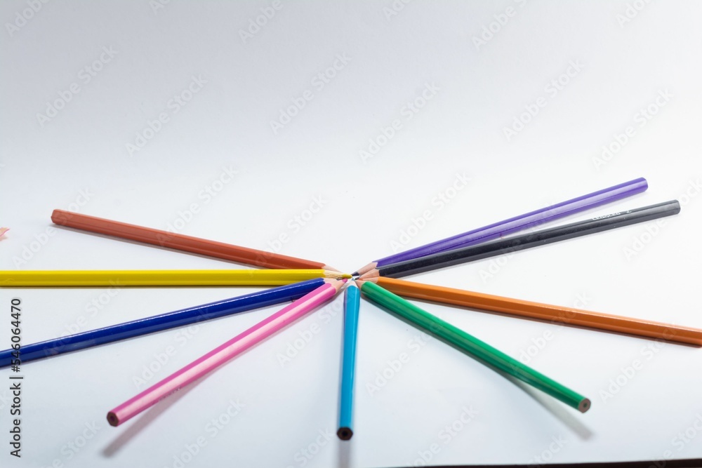 Wall mural Colorful wooden pencils isolated on white background. 