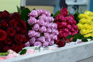 Beautiful multicolor peony roses in the shop