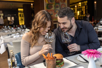 Romantic couple having lunch in the restaurant