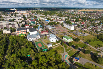 aerial panoramic view from great height of provincial town with a private sector and high-rise...
