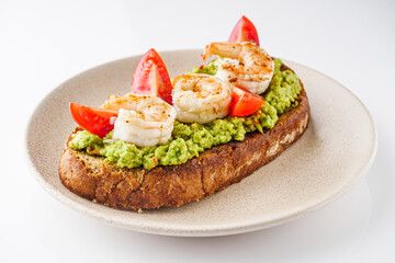 delicious Italian bruschetta with shrimps on a white background