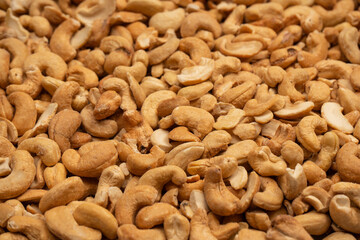 A group of almonds, pistachios, walnuts, macadamia, cashews.