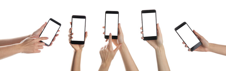 Set of hands holding mobile phones with blank screens on white background