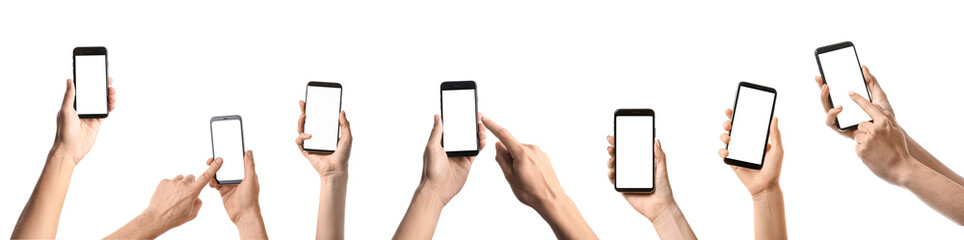 Group of hands holding mobile phones with blank screens on white background