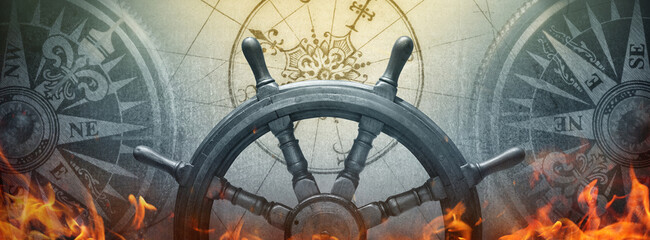 Ship's helm and an old compass, ancient map. Background on the theme of history, pirates, corsairs,...
