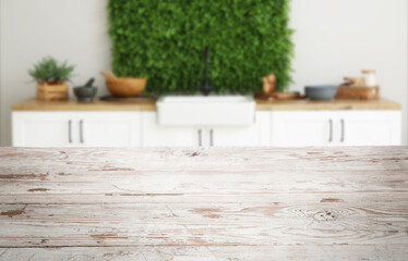 Obraz premium Empty white wooden table in interior of modern kitchen