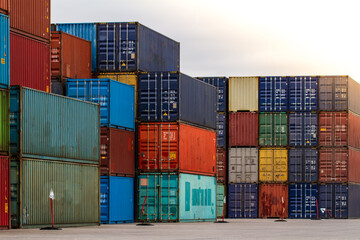 Cargo containers. Cargo container yard. Stack of freight containers at the docks. Industrial yard. Import and export logistic concept.