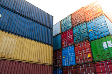 Cargo containers. Cargo container yard. Stack of freight containers at the docks. Industrial yard. Import and export logistic concept.