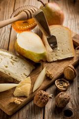 traditional italian cheese with pear honey and nuts