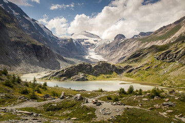 Fototapeta na wymiar Beautiful view of Sandersee lake, High Tauern National Park, Carinthia, Austria. Pasterze Glacier lake with Johannisberg summit in the background. Close by Grossglockner and Kaiser Franz Josefs Hohe