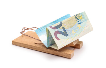 Wooden mousetrap with money on white background