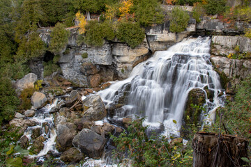 waterfall in autumn forest