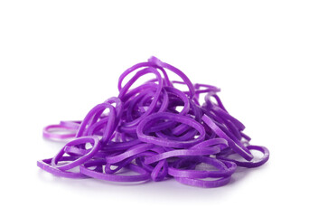 Heap of purple rubber bands on white background